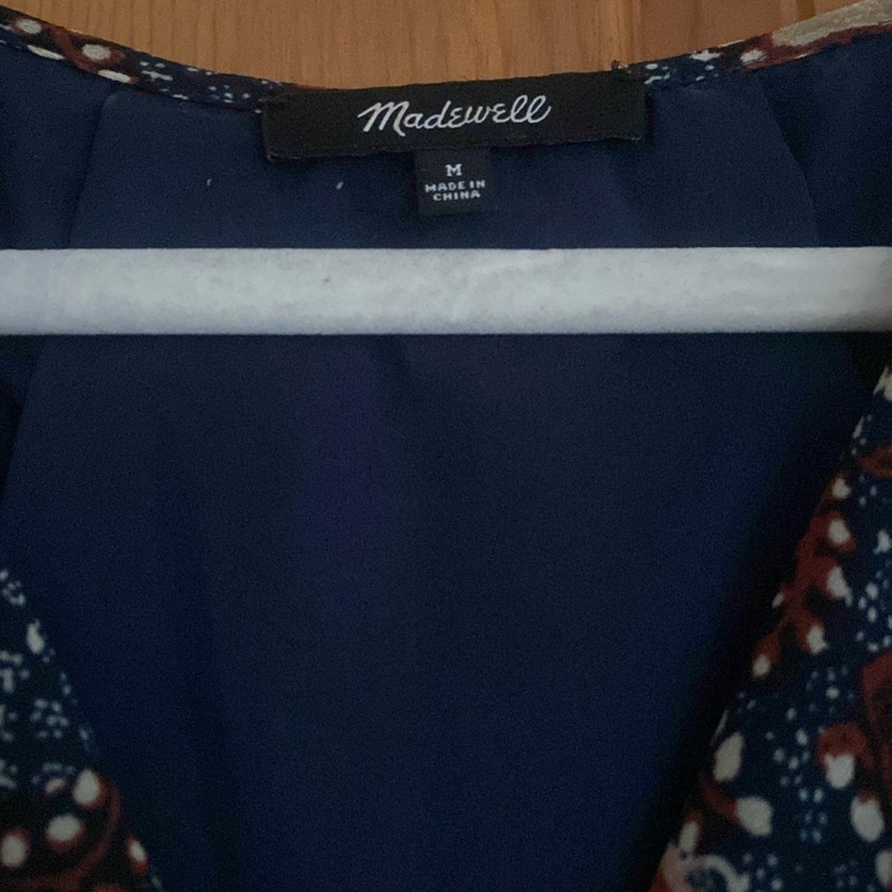 Madewell sleeveless dress with flutter ruffle at sleeve top and along the bottom